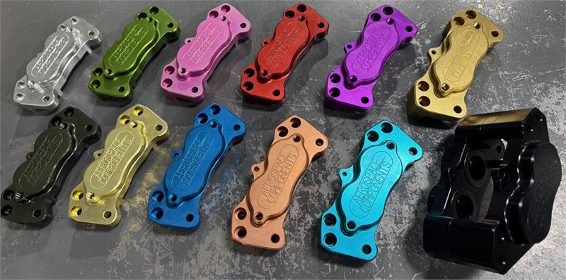 Custom anodizing for brake calipers