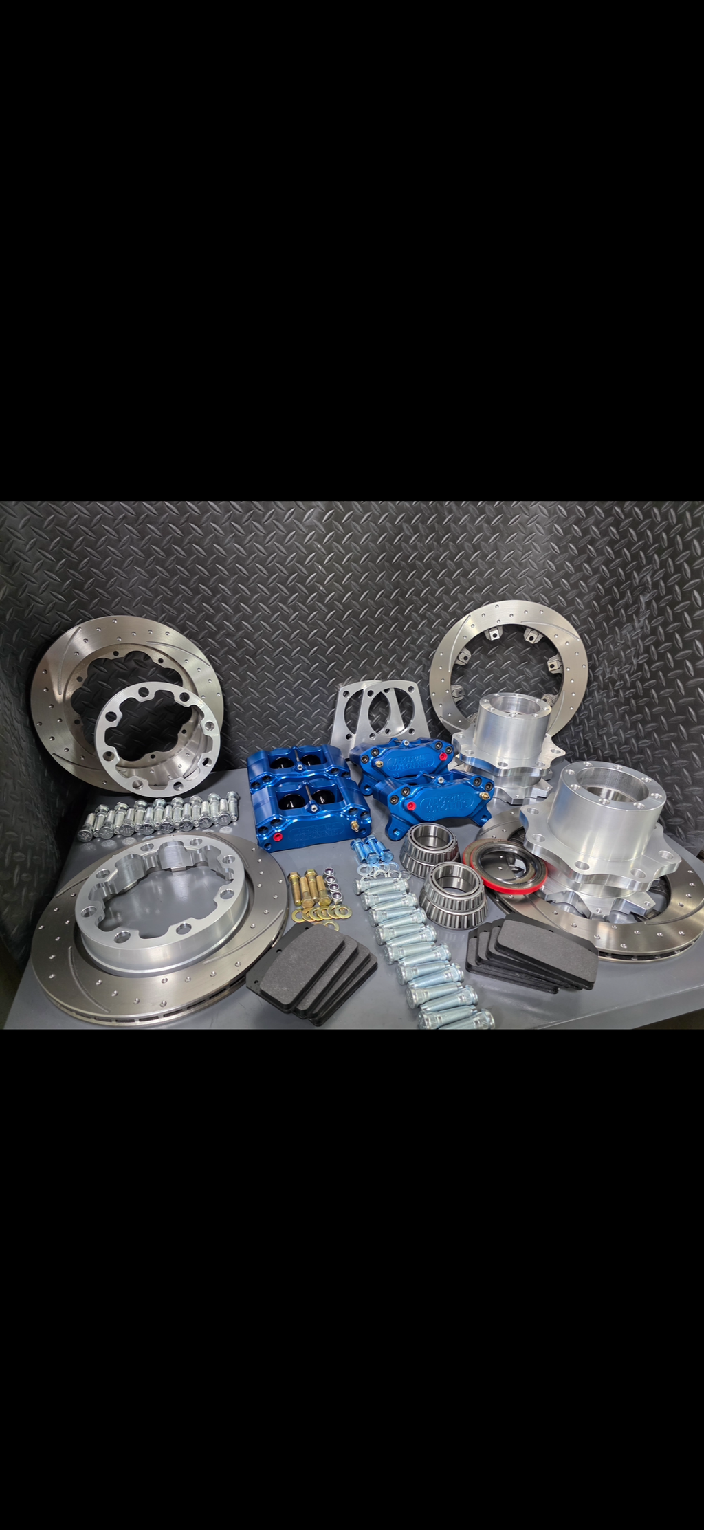 Custom anodizing for brake calipers